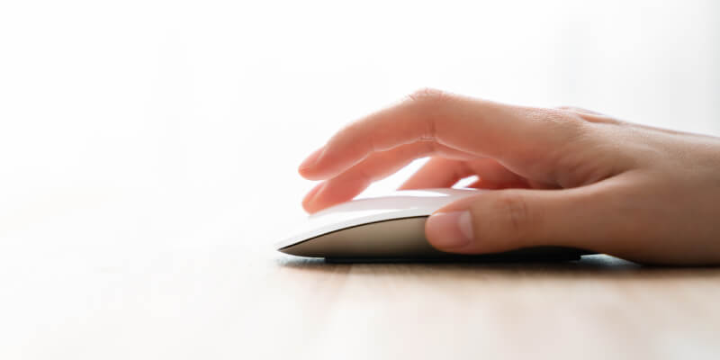 Hand clicking mouse