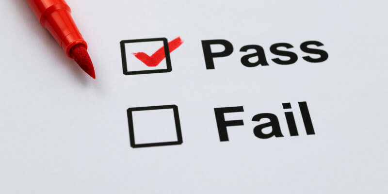 Tickboxes reading pass and fail, with pass ticked